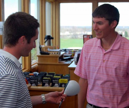 Summer Jobs: Ian Suszko and Logan May, left, discuss clubs in the Katke Pro Shop. Right, FSU student Ashley Schultz helps a customer at her job at B-Tan. There are many jobs available for students staying in Big Rapids over the Summer. Photo By: Sam Lehnert | Ad Layout Assistant Summer Jobs: Ian Suszko and Logan May, left, discuss clubs in the Katke Pro Shop. Right, FSU student Ashley Schultz helps a customer at her job at B-Tan. There are many jobs available for students staying in Big Rapids over the Summer. Photo By: Sam Lehnert | Ad Layout Assistant